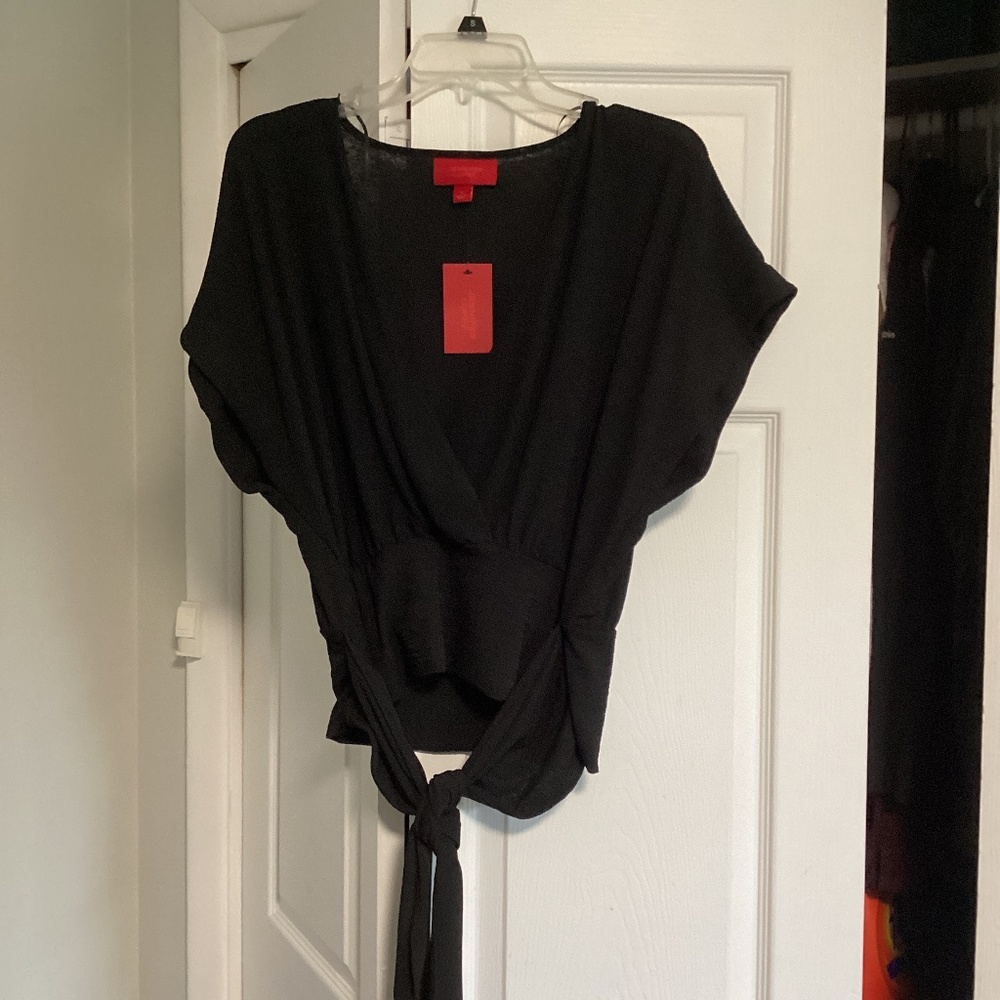 2 Jennifer Lopez Criss Cross Tops